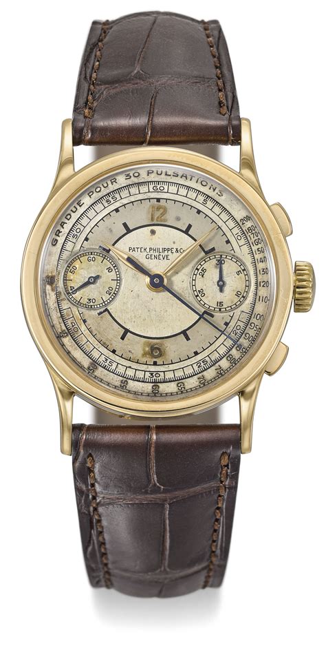 PATEK PHILIPPE. A VERY FINE AND RARE 18K GOLD AND 